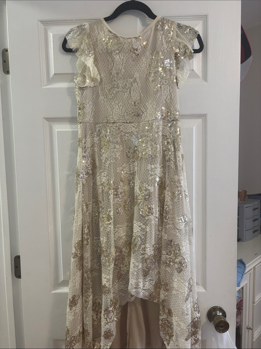 Sparkly lace dress with flutter ruffle sleeves, an easy flowy silhouette